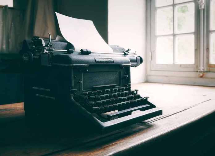 Classic, large, black, tall typewriter: imagine Faulkner tapping away, writing his novel, working on his masterpiece.