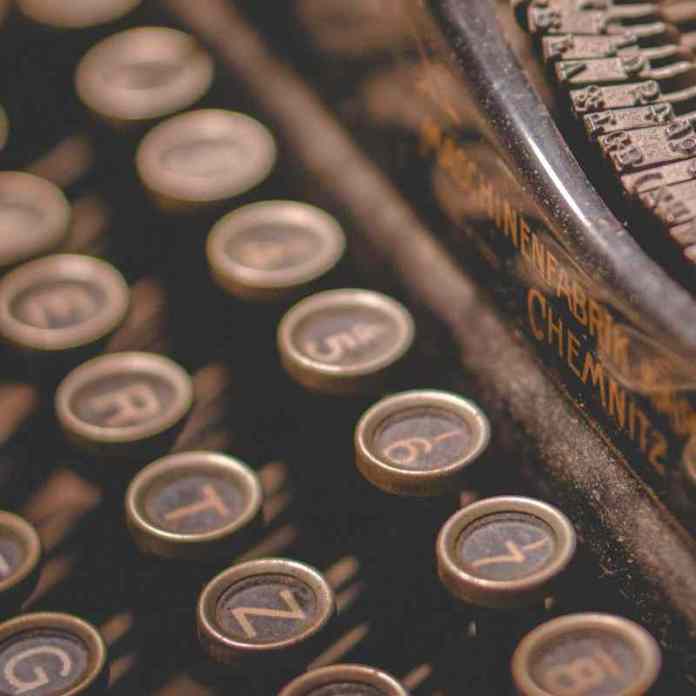 Close-up of old fashioned typewriter keys. Imagine Hemingway working on a novel, typing out his masterpiece. The course on 'How to Structure a Novel' led by Gail Owen writer will turn your ideas into real pages.